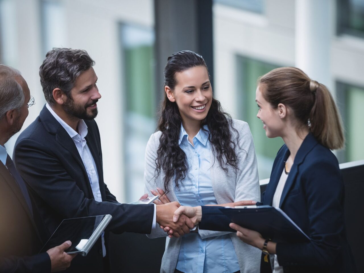 businesspeople-having-discussion-office