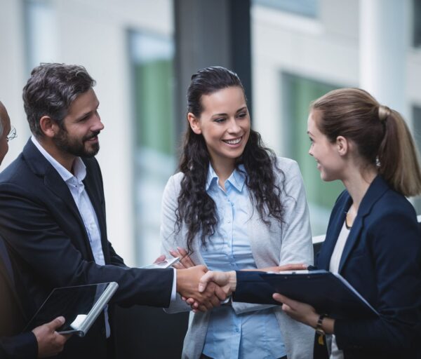 businesspeople-having-discussion-office