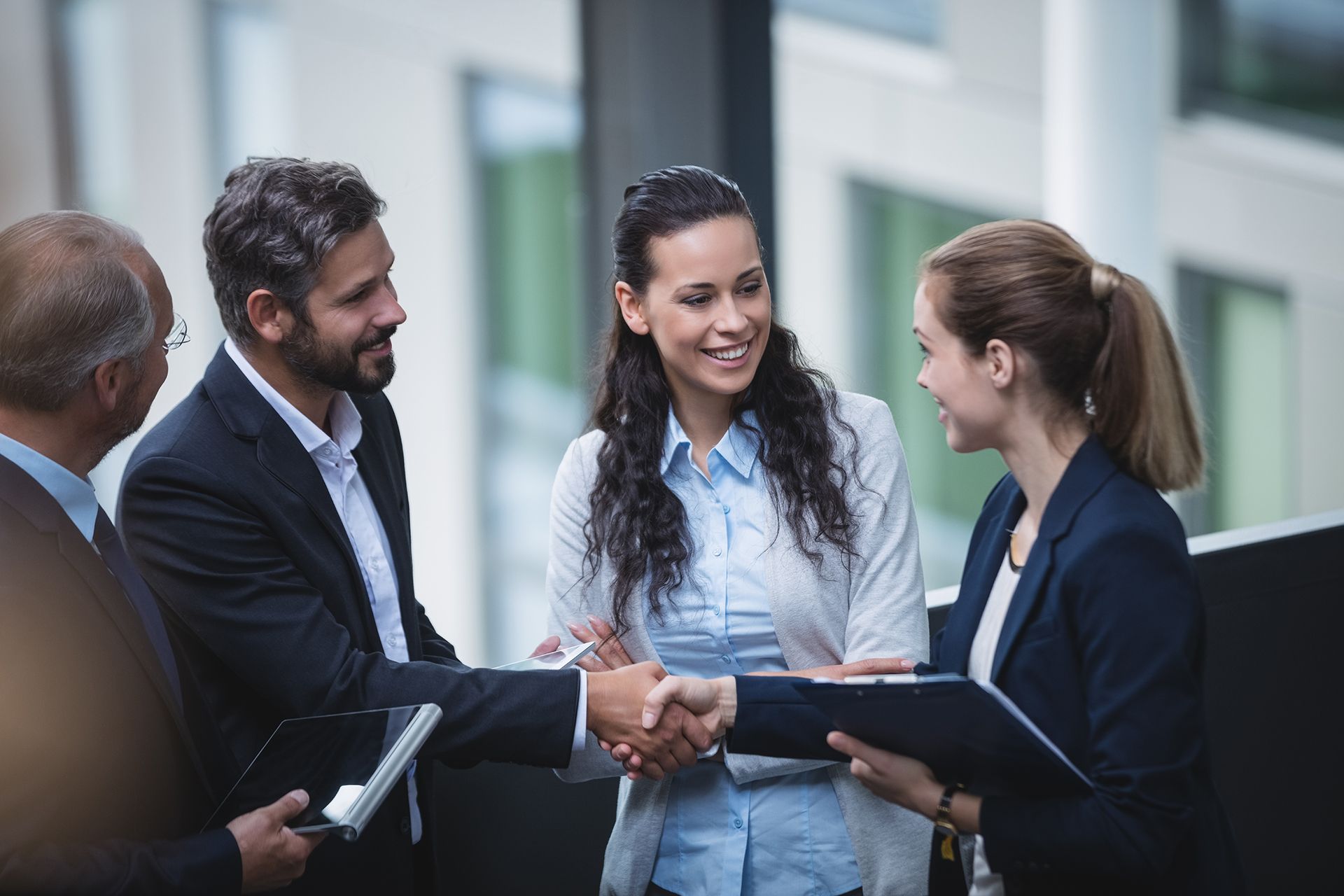 businesspeople-having-discussion-office